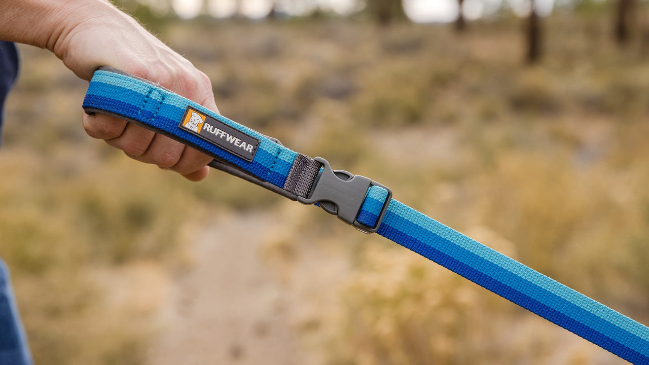 TENUE À LA MAIN OU PORTÉE À LA TAILLE