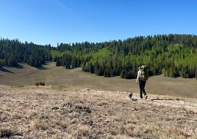 Katie and Quinci on the trail backpacking.